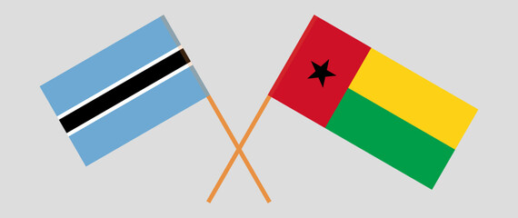 Crossed flags of Botswana and Guinea-Bissau. Official colors. Correct proportion