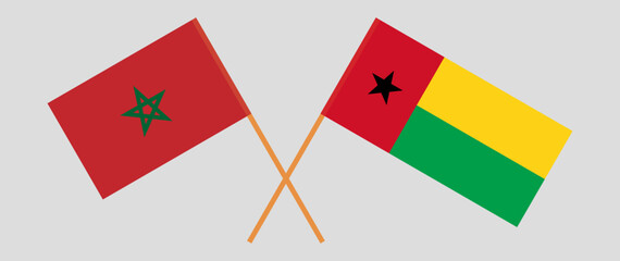 Crossed flags of Morocco and Guinea-Bissau. Official colors. Correct proportion