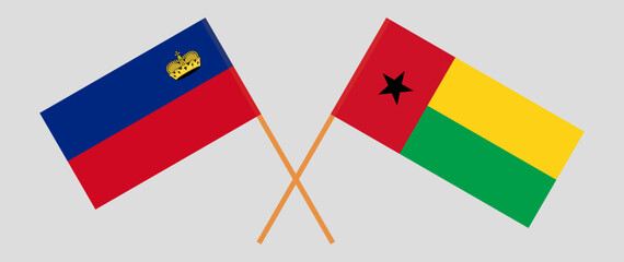 Crossed flags of Liechtenstein and Guinea-Bissau. Official colors. Correct proportion