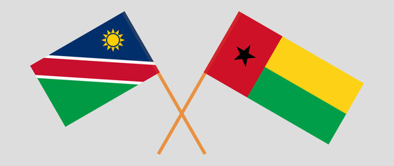 Crossed flags of Namibia and Guinea-Bissau. Official colors. Correct proportion