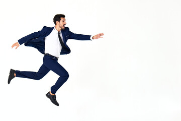 Man business smile with teeth in costume running and jumping flying up open mouth happiness and surprise full-length on white isolated background copy space 
