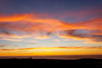 Colorful sunset in the sky and the beach 
