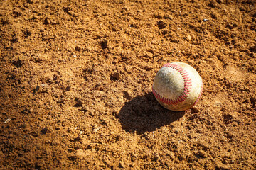 Baseball field dirt with ball