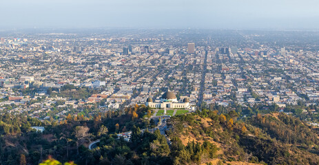 Griffith Observatory and Los Angeles cityscape view from the hills 