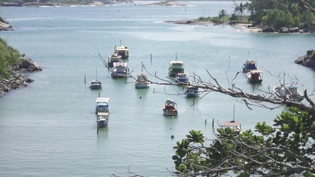 Boats moored on the beach seen from above. Praia do Ribeiro, Espirito Santo state, Brazil.