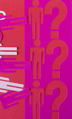 stencil with glyphs or dingbats of stick figures and question marks on red paper