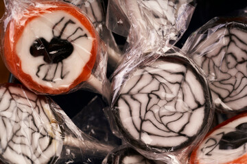 halloween macro close up lollipops with spiders and webs