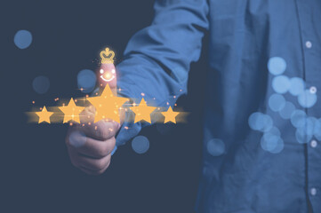 Rating to excellent the popular service with copy space. Customer service evaluation and satisfaction concept. Businessman client thumb with emotion smile face icon and five stars satisfaction.