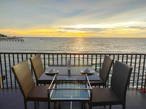 Thai restaurant at sunset reserved for customer dinner on the beach in Thailand
