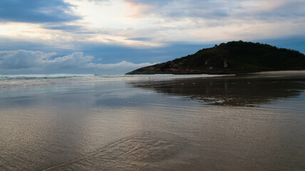 Beach with Cloudy Sky