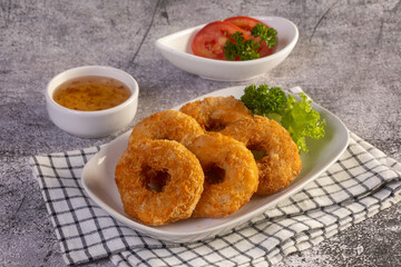 Deep fried shrimp cake on white plate, Thai food