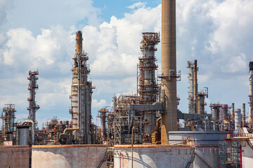 Fototapeta na wymiar Scene heavy of tank oil refinery plant stack and tower column tank oil of Petrochemistry