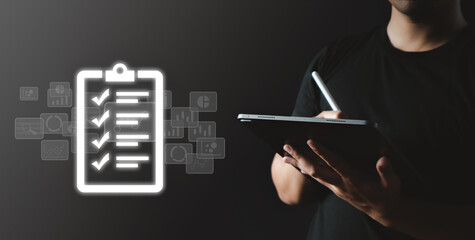 Business owner checklist on tablet with data virtual screen. 