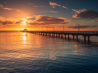 Fototapeta na wymiar Sunrise Over The Pier