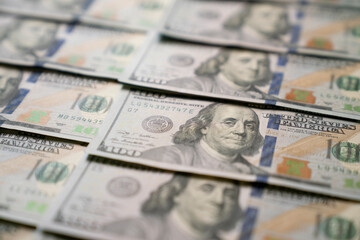 US one hundred dollars bills money line pattern business finance America concept, close up