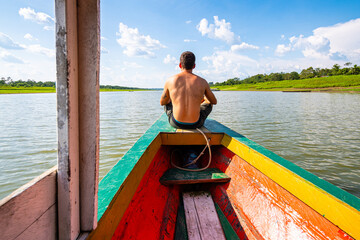 boat trip throught amazonian river in peru - obrazy, fototapety, plakaty