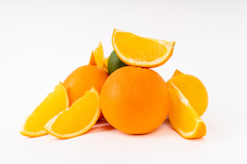 Orange, lime and lemon fruits on a white background
