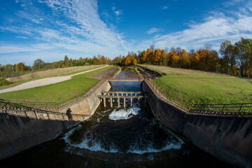 Fototapeta na wymiar Lake river dam in autumn