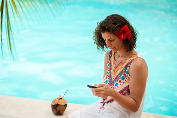 Beautiful woman at an exotic resort