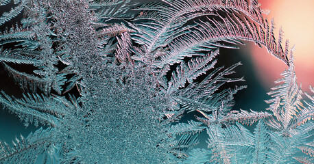 Abstract Christmas horizontal stories. Ice crystals on frozen window glass pane. Frost drawing. Winter season patterns. Dark turquoise and red tinted illustration. Rime pattern. Cold and crystal