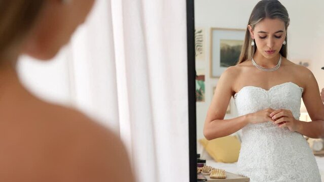 Anxiety, stress and bride thinking in mirror feeling scared, mistake or fear for marriage commitment. Nervous, mental health and worry with woman breathing in wedding dress before event