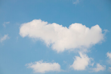 Fototapeta premium Clouds in the blue sky. Summer blue sky cloud gradient light white background. Beauty clear cloudy in sunshine calm bright winter air background. Gloomy vivid cyan landscape in environment day.