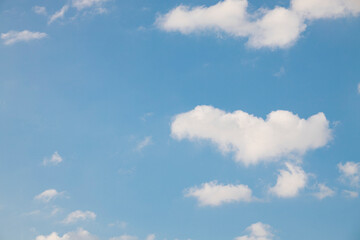 Fototapeta premium Clouds in the blue sky. Summer blue sky cloud gradient light white background. Beauty clear cloudy in sunshine calm bright winter air background. Gloomy vivid cyan landscape in environment day.