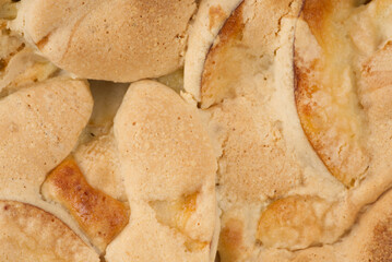The texture of an oven baked apple pie Closeup