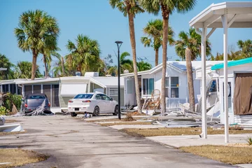 Foto op Aluminium Mobile homes destroyed by Hurricane Ian Fort Myers FL © Felix Mizioznikov