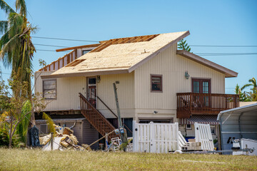 Homes with roofs blown off from Hurricane Ian Fort Myers Beach FL