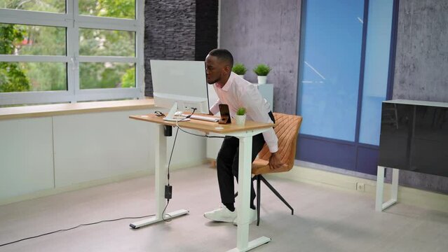 Adjustable Height Desk Stand In Office