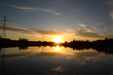 Obraz premium sunset over the pond