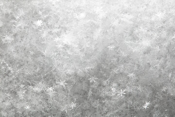 White snowflakes in winter as a background.