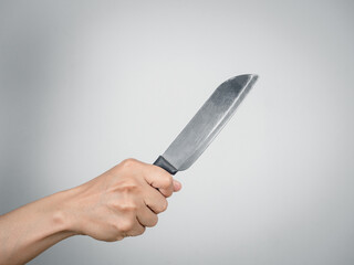 Close up hand holding silver knief,Killer hand holding knief isolated