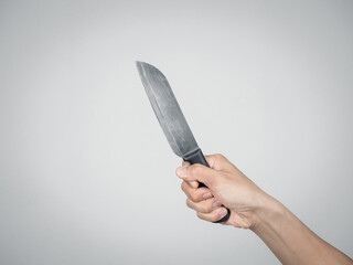 Close up hand holding silver knief,Killer hand holding knief isolated