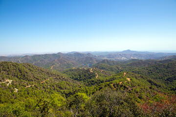 Fototapeta na wymiar Landscape in Troodos mountains, Cyprus. Winding roads pass through the mountains of Cyprus