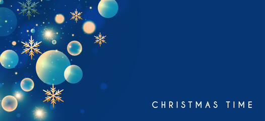 Christmas bokeh light effect with gold sowflakes.