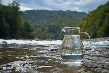 Pitcher of clean river water.