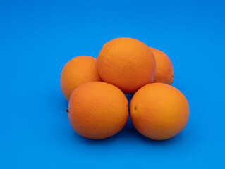 oranges on blue background