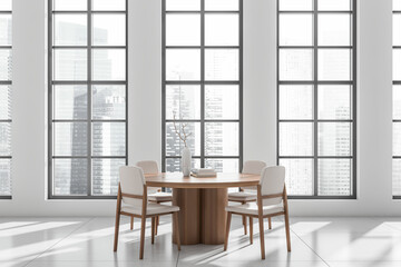 Light living room interior with table and chairs, decoration and window