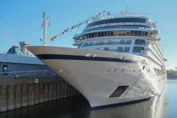 Viking cruiseship or cruise ship liner Star in port of Montreal, Canada on sunny day on St. Lawrence River for Indian summer East Coast cruising with downtown skyline and terminal