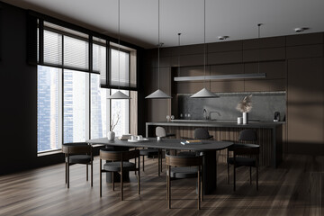 Brown kitchen interior with bar island and cooking zone, dining area and window