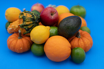Naklejka na ściany i meble fruits and vegetables on blue backgrund