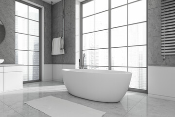 Naklejka na ściany i meble Modern bathroom interior with bathtub in the corner and panoramic window