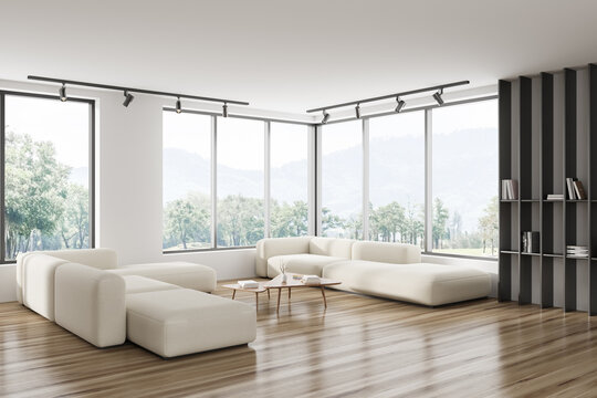 Light living room interior with soft place and shelf, panoramic window