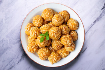 Pine nut penelles. Traditional autumn recipe for desserts made with marzipan in Barcelona