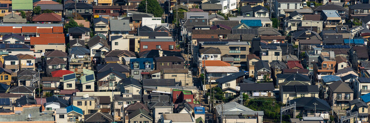 Fototapeta premium Greater Tokyo are dense buildings and houses at daytime.