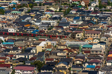 Fototapeta na wymiar Greater Tokyo are dense buildings and houses at daytime.