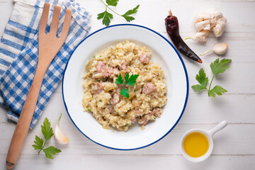 Catalan butifarra sausage risotto with parmesan. Mixed Spanish and Italian recipe.