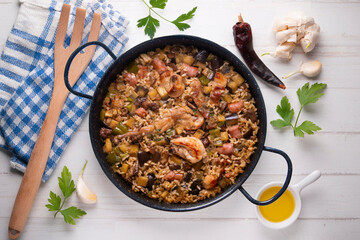 Rabbit and sausage paella. Typical Spanish paella tapa recipe with meat.